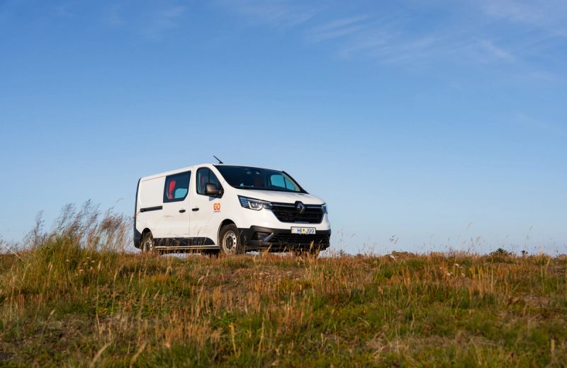 Go LITE 3-person heated campervan parked on a grassy hilltop in Iceland